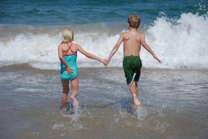 brother-and-sister-into-the-ocean-2-1430015-300x201